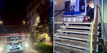 Požár v bytovém domě, hasiči zachraňovali 14 lidí