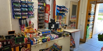 Ozbrojená loupež ve večerce v Toužimské ulici