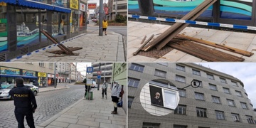 Těžká dřevěná roleta dopadla přímo za záda procházející ženy