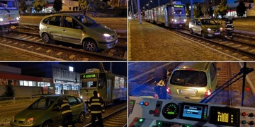 Auto v tramvajovém kolejišti