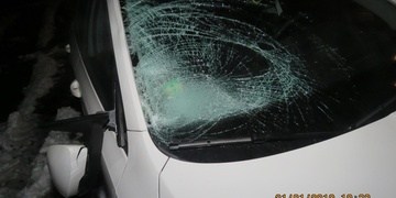 Střet osobního auta s opilým chodcem