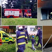 Požár bytu na Vinicích, majitelku transportují do nemocnice