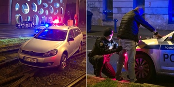 Těžce opilý řidič skončil s autem v kolejišti